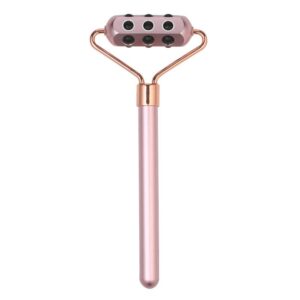 Rullo massaggiatore rosa con struttura in metallo oro rosa e sfere scure, su sfondo bianco