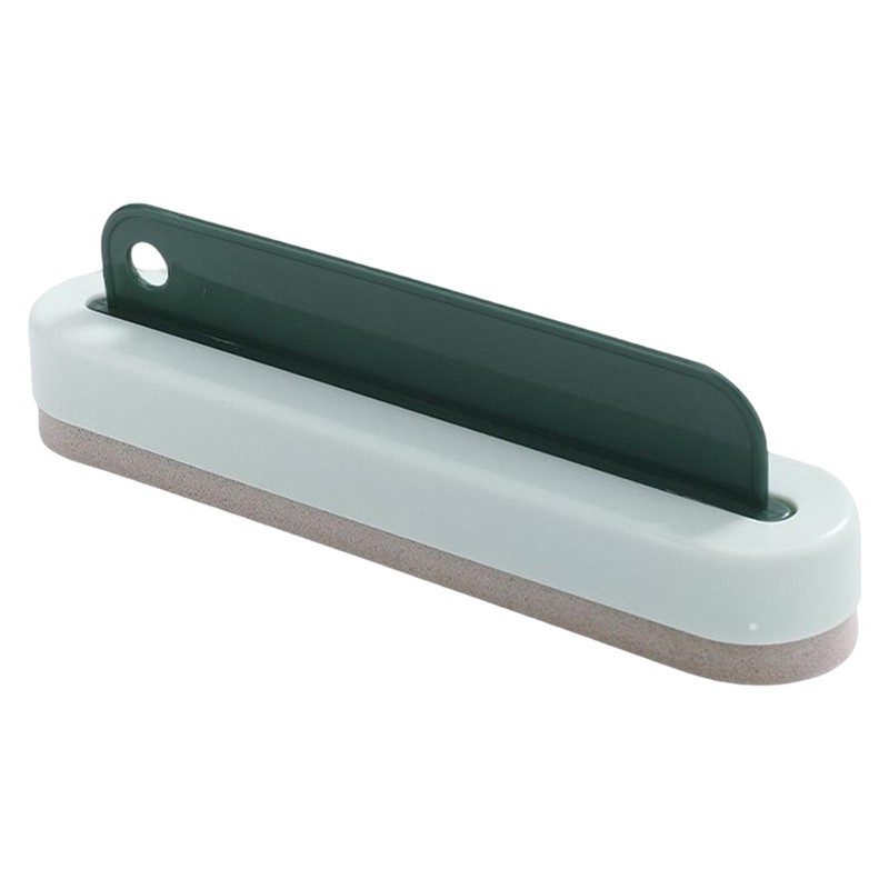Tergivetro con supporto verde menta, spugna grigio-beige sotto e lama verde scuro con foro